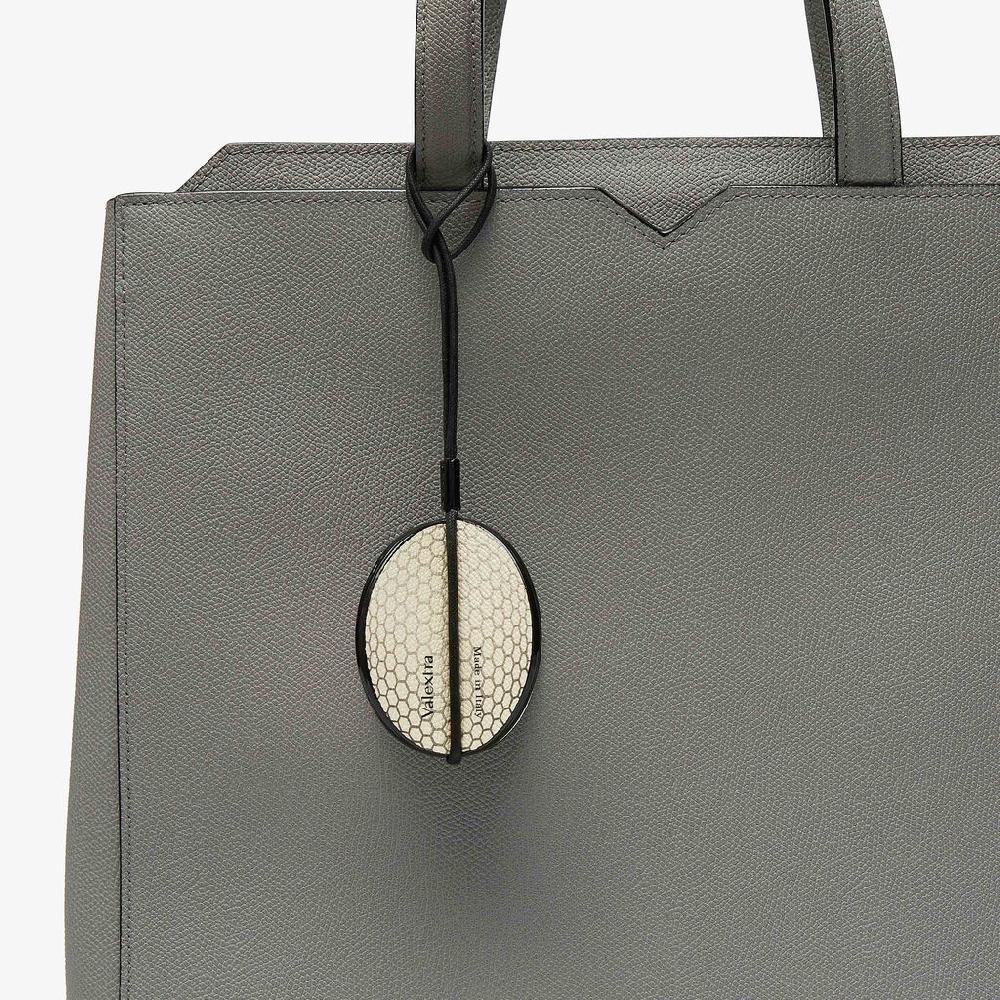 Valextra Charm palla da golf di Lusso in Pelle Bianca e Nera | Valextra Negozio
